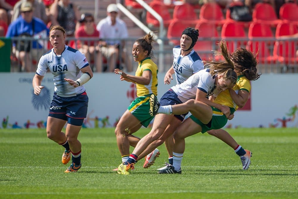 July 11,  2015, Toronto, Ontario, Canada; Kelly Griffin (#2( of the USA with a hard tackle during the USA vs Brazil in Women's Rugby during the Rugby Seven matches at the Toronto 2015 Pan Am Games. 
Final score of the game was USA 26 and Brazil 7.
Photo Credit: Al Milligan - FotoJump