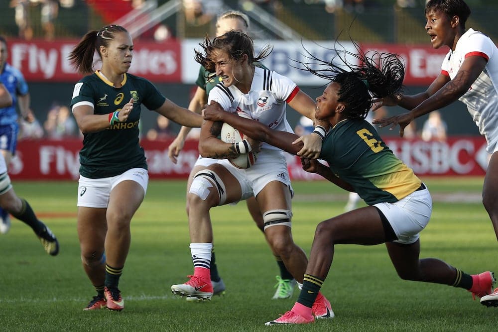 November 30, 2017; Dubai, United Arab Emirates; USA's Ryan Carlyle charges through the South Africa defense during the HSBC World Rugby Women's Sevens Series 2017 at The Sevens Stadium. Photo credit: Michael Lee - Taiwan Mike Photography - KLC fotos for USA Rugby